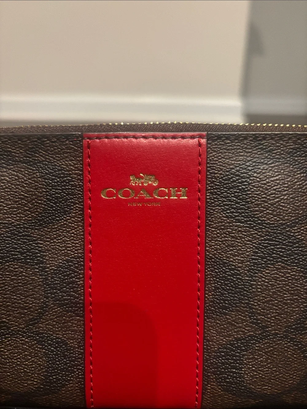 Coach Brown Signature Wristlet with Red Center Stripe